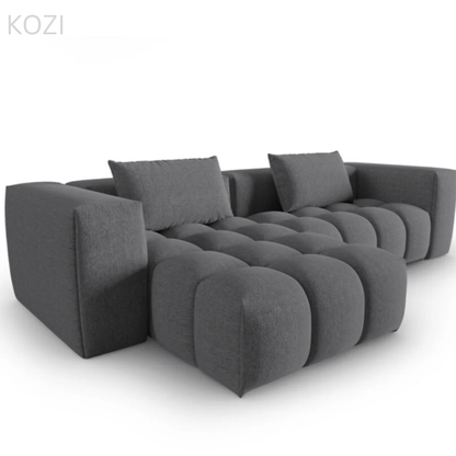 Abigail Sectional Sofa with Tufted Cushioning